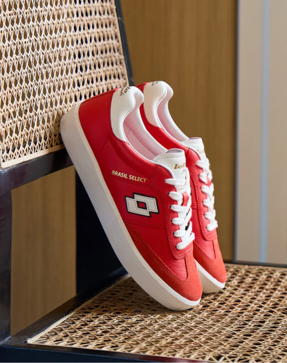 Red LOTTO casual sneakers with gum sole for men, featuring a sleek low-top design, lace-up closure, and sporty streetwear style perfect for everyday wear and casual outfits.